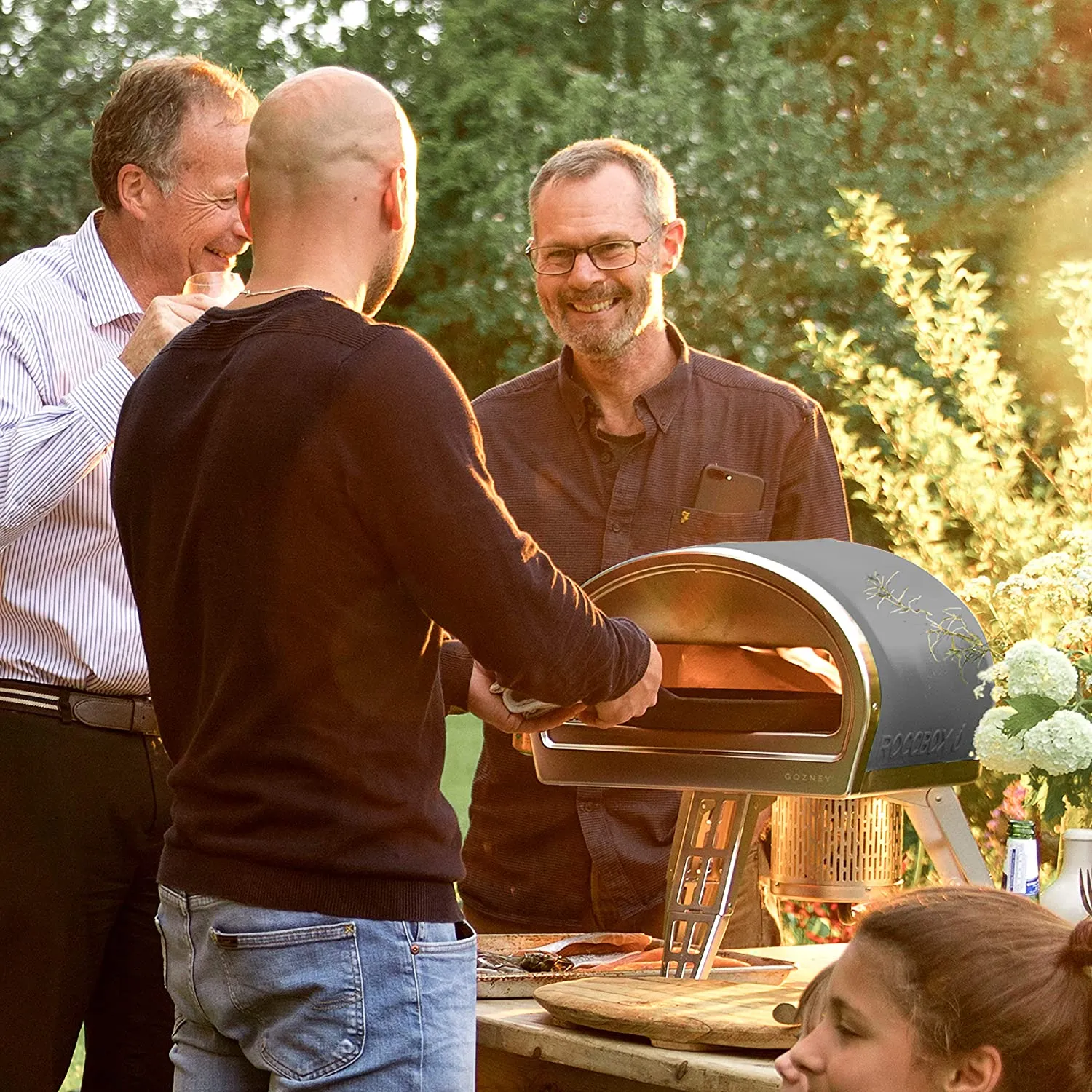 ROCCBOX Gozney Portable Outdoor Pizza Oven - Includes Professional Grade Pizza Peel, Built-In Thermometer and Safe Touch Silicone Jacket - Propane Gas Fired, With Rolling Wood Flame - Grey